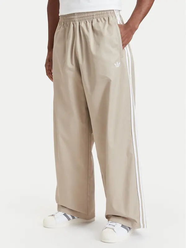 Adidas adidas Donji dio trenerke Adicolor Sst Cotton Twill Trousers KR1385 Bež Relaxed Fit