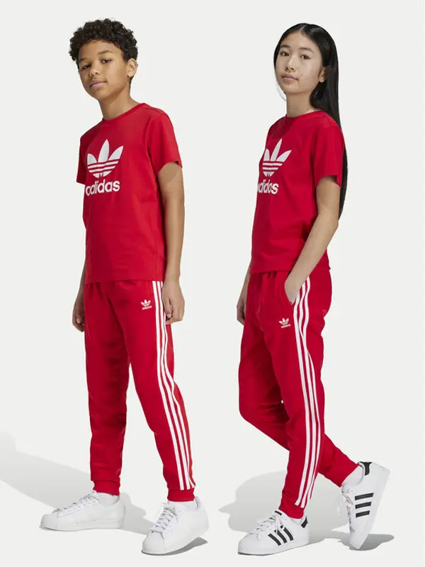 Adidas adidas Donji dio trenerke adicolor SST IX7631 Crvena Regular Fit