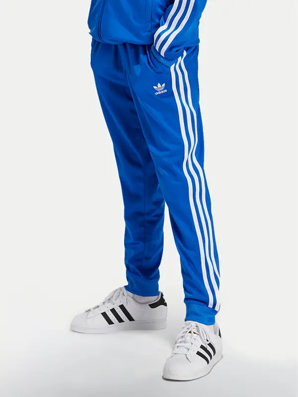 Adidas adidas Donji dio trenerke adicolor SST IY4007 Plava Regular Fit