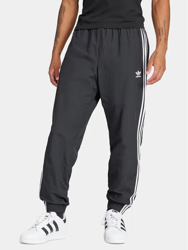 Adidas adidas Donji dio trenerke Adicolor Woven Firebird IT2501 Crna Regular Fit