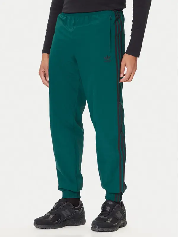 Adidas adidas Donji dio trenerke adicolor Woven Firebird JY1335 Zelena Regular Fit