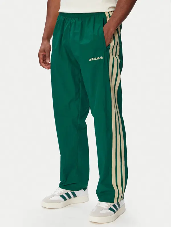 Adidas adidas Donji dio trenerke Cutline Track KW8022 Zelena Regular Fit