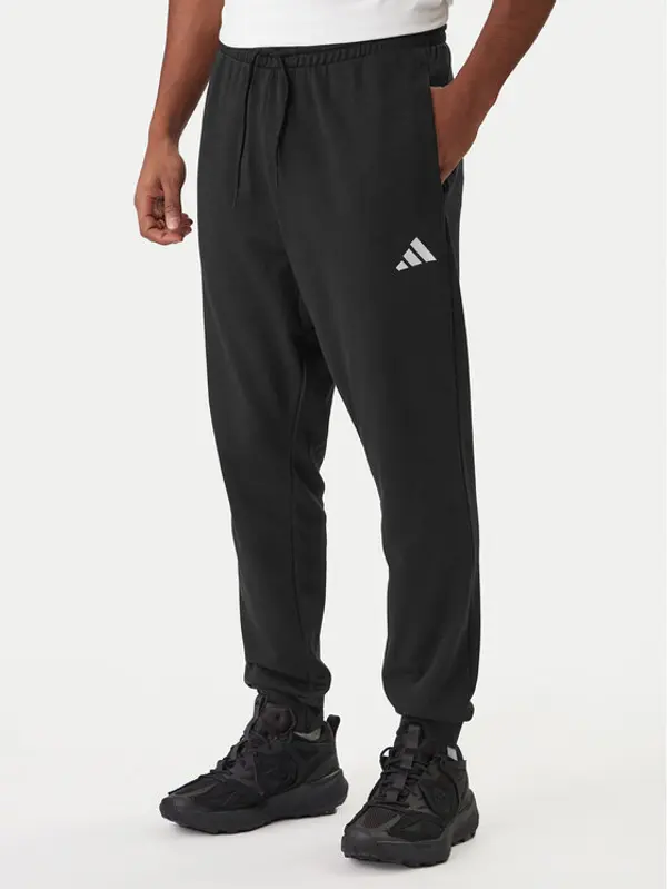 Adidas adidas Donji dio trenerke Essentials Feel Cozy JE3854 Crna Regular Fit