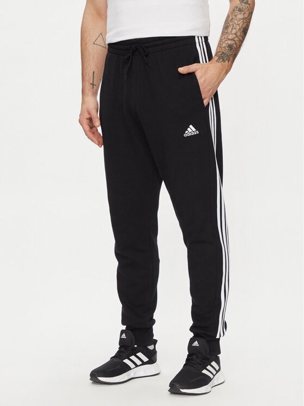 adidas adidas Donji dio trenerke Essentials French Terry Tapered Cuff 3-Stripes Joggers HA4337 Crna Regular Fit