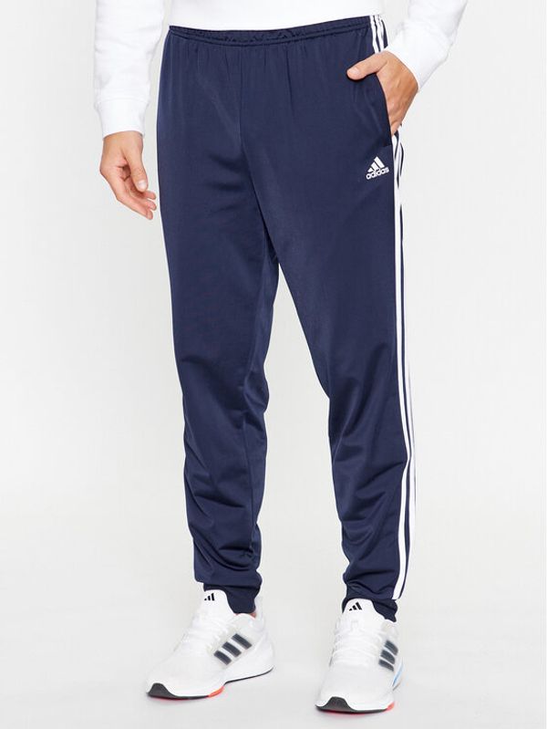 adidas adidas Donji dio trenerke Essentials Warm-Up 3-Stripes H46106 Tamnoplava Regular Fit