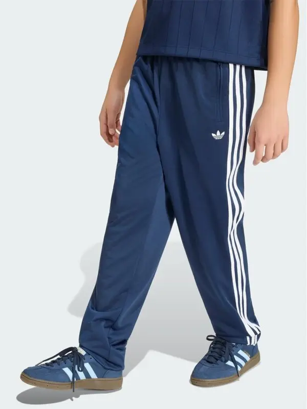 Adidas adidas Donji dio trenerke Firebird HZ6650 Tamnoplava Regular Fit