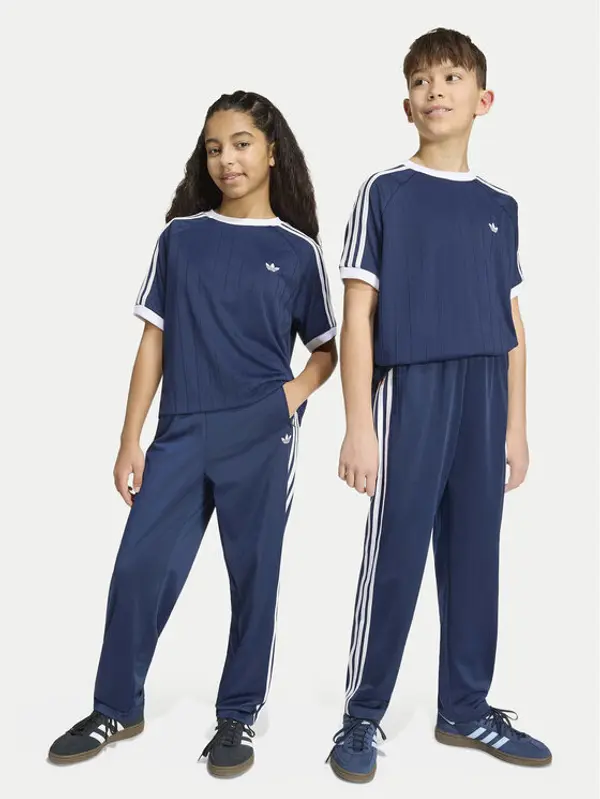 Adidas adidas Donji dio trenerke Firebird HZ6650 Tamnoplava Regular Fit