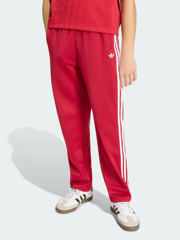 Adidas adidas Donji dio trenerke Firebird HZ6651 Crvena Regular Fit