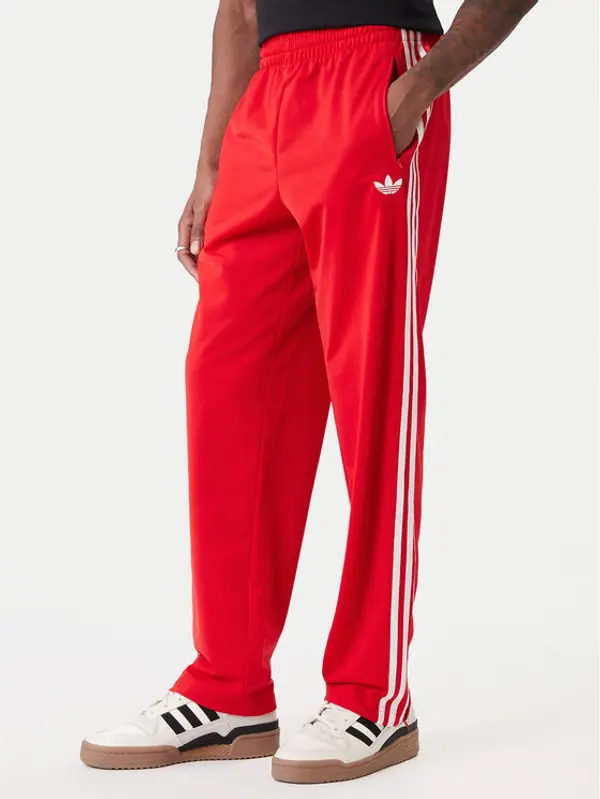 Adidas adidas Donji dio trenerke Firebird KD8319 Crvena Loose Fit