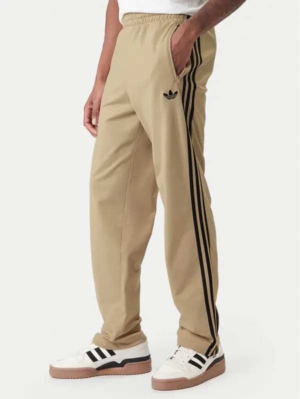Adidas adidas Donji dio trenerke Firebird KE6679 Bež Loose Fit