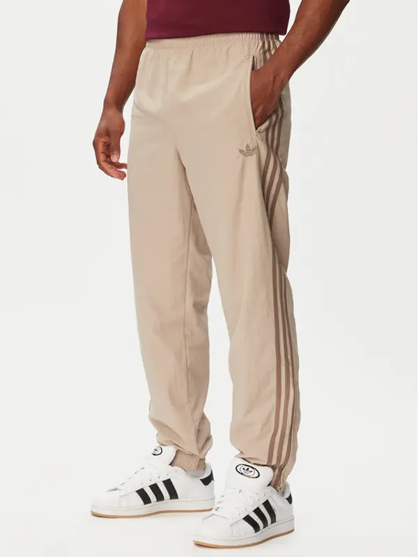 Adidas adidas Donji dio trenerke Firebird KS7503 Bež Regular Fit