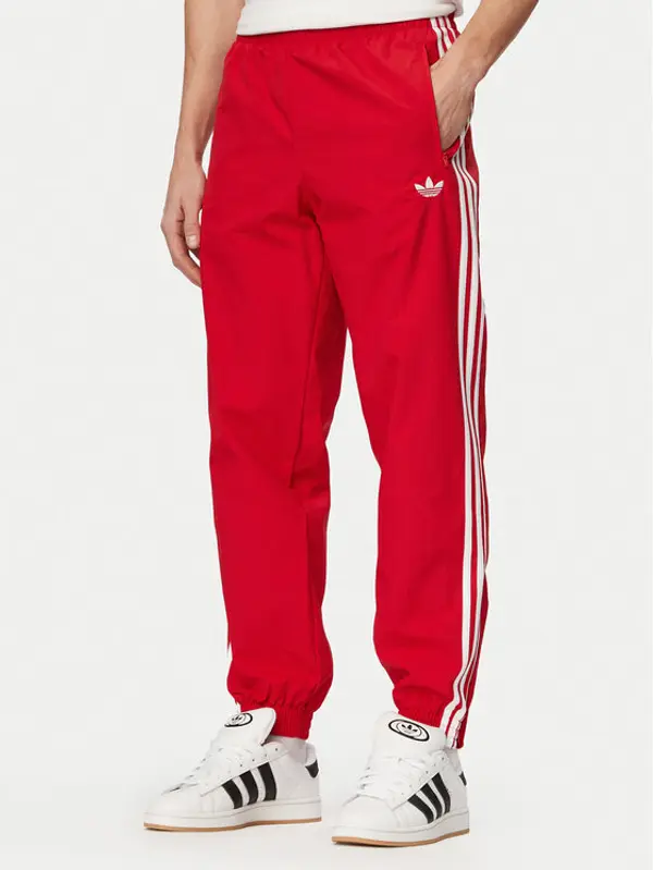 Adidas adidas Donji dio trenerke Firebird Woven KE1369 Crvena Regular Fit