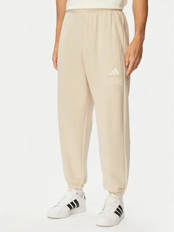 Adidas adidas Donji dio trenerke Seasonal Essentials Collegiate French Terry Cuffed KF4265 Bež Regular Fit