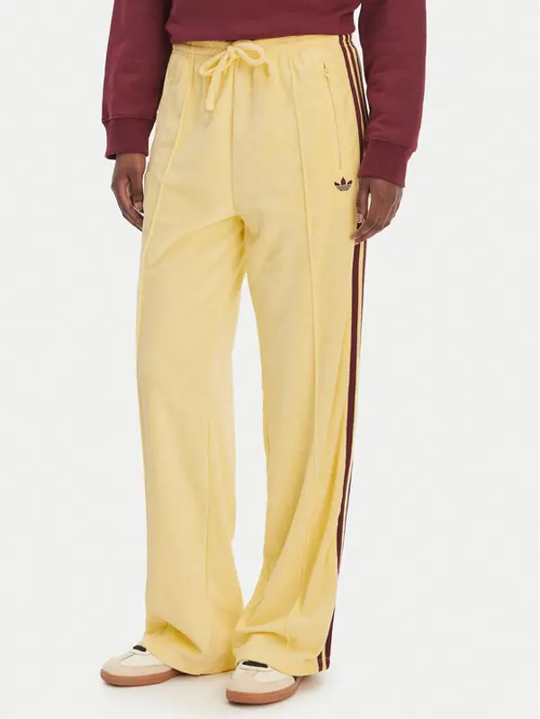 Adidas adidas Donji dio trenerke Terry Towel Firebird KQ6662 Žuta Loose Fit