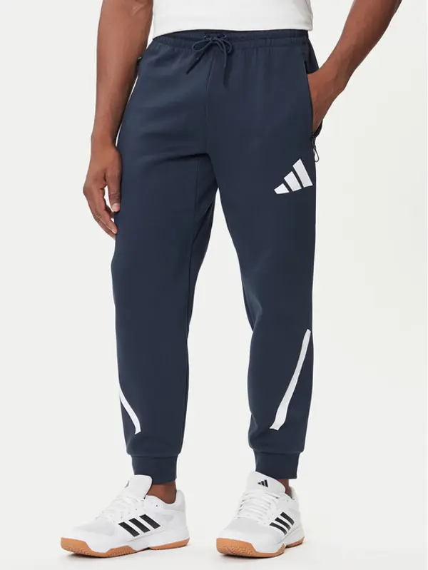Adidas adidas Donji dio trenerke Z.N.E. JW4723 Tamnoplava Loose Fit