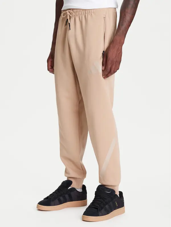 Adidas adidas Donji dio trenerke Z.N.E. JW4725 Bež Loose Fit