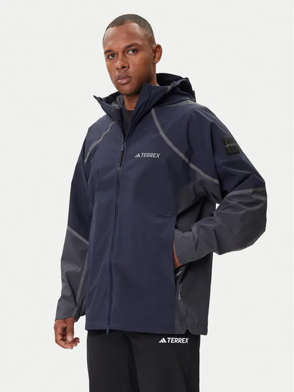 Adidas adidas Vodootporna jakna Nat Geo Climaproof KC2343 Tamnoplava Loose Fit
