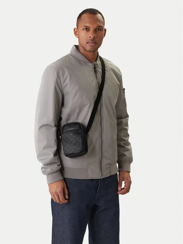 Calvin Klein Calvin Klein Crossover torbica Emblem Aop Emboss Slim Reporter LV04D3228G Crna