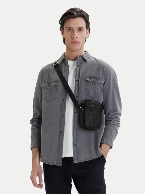 Calvin Klein Calvin Klein Crossover torbica Emblem Aop Emboss Slim Reporter LV04D3371G Crna