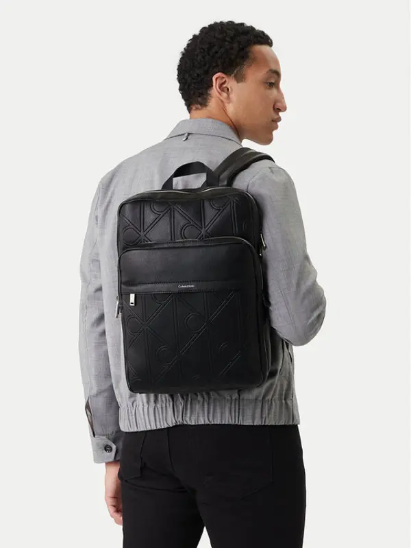 Calvin Klein Calvin Klein Crossover torbica Emblem Aop Emboss Slim Square Bp LV04D3328G Crna
