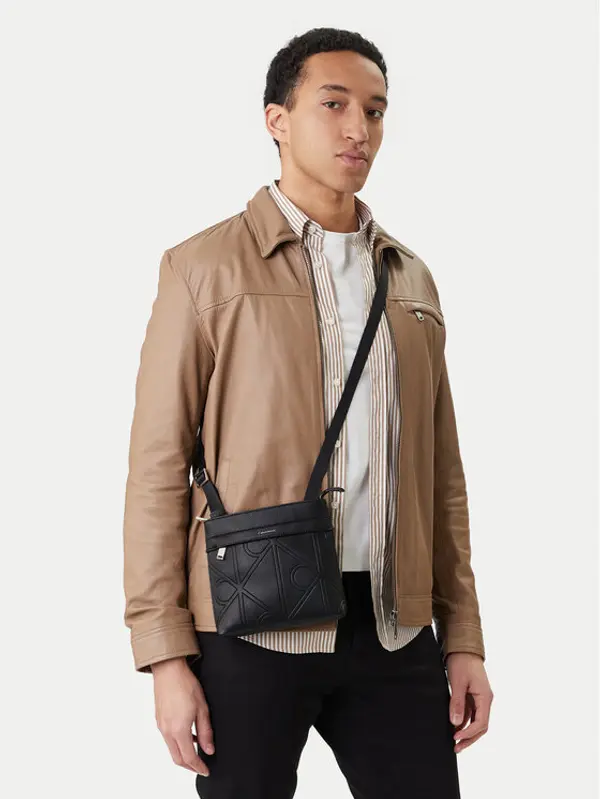 Calvin Klein Calvin Klein Crossover torbica Emblem Emboss Slim Flatpack LV04D3370G Crna