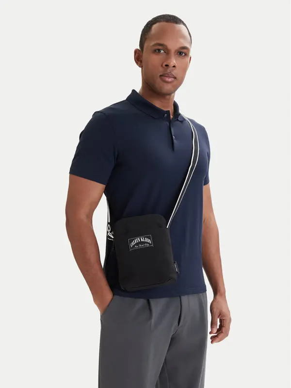 Calvin Klein Calvin Klein Crossover torbica Graphic Capsule Reporter LV04D3346G Crna