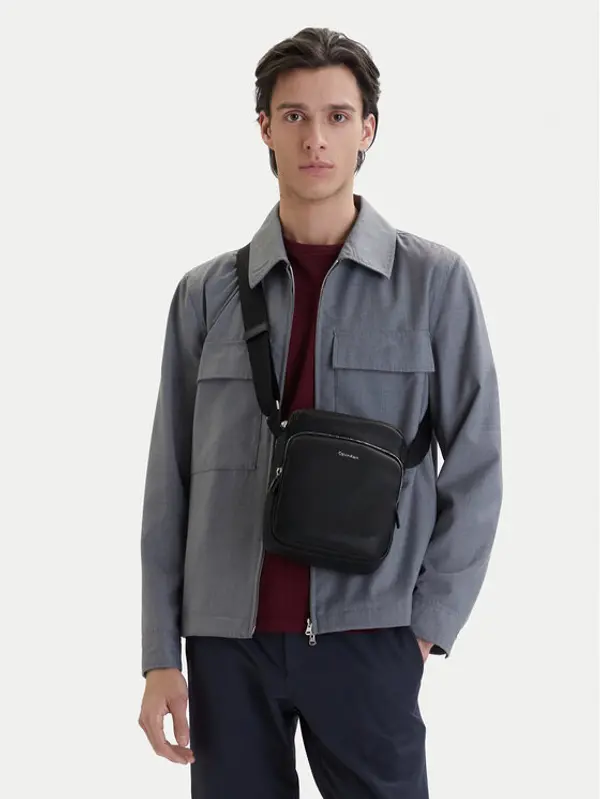 Calvin Klein Calvin Klein Crossover torbica Raised Pocket Reporter LV04D3317G Crna