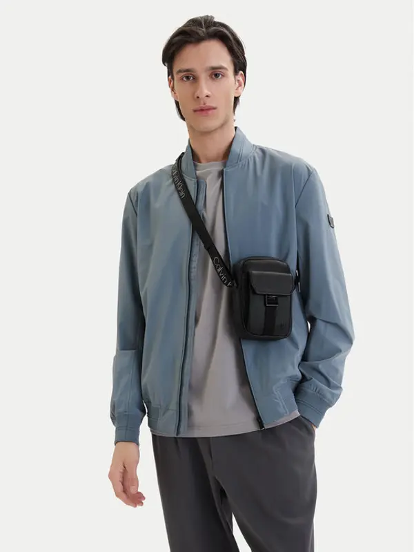 Calvin Klein Calvin Klein Crossover torbica Webbing Strap Slim Reporter LV04D3281G Crna
