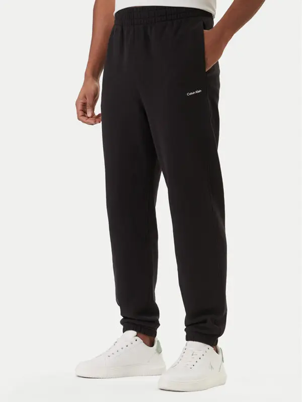 Calvin Klein Calvin Klein Donji dio trenerke Nano Standard Logo LV04LF247G Crna Regular Fit