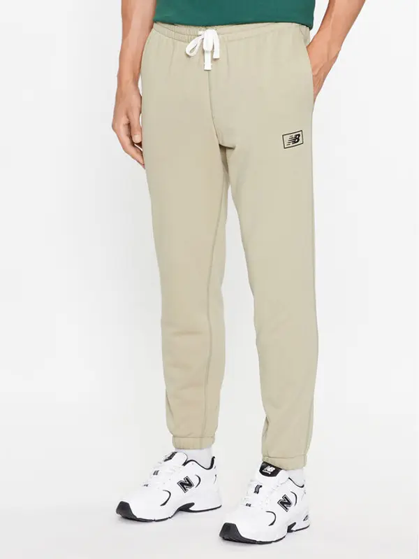 New Balance New Balance Donji dio trenerke NB Essentials Sweatpant MP33509 Zelena Regular Fit