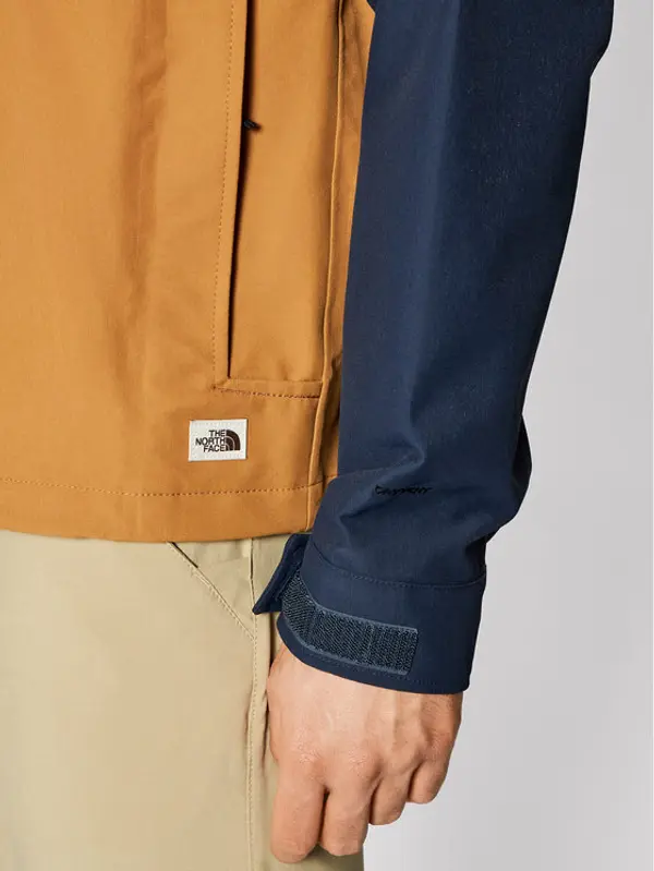 The North Face The North Face Anorak jakna Windjammer NF0A493G Tamnoplava Regular Fit
