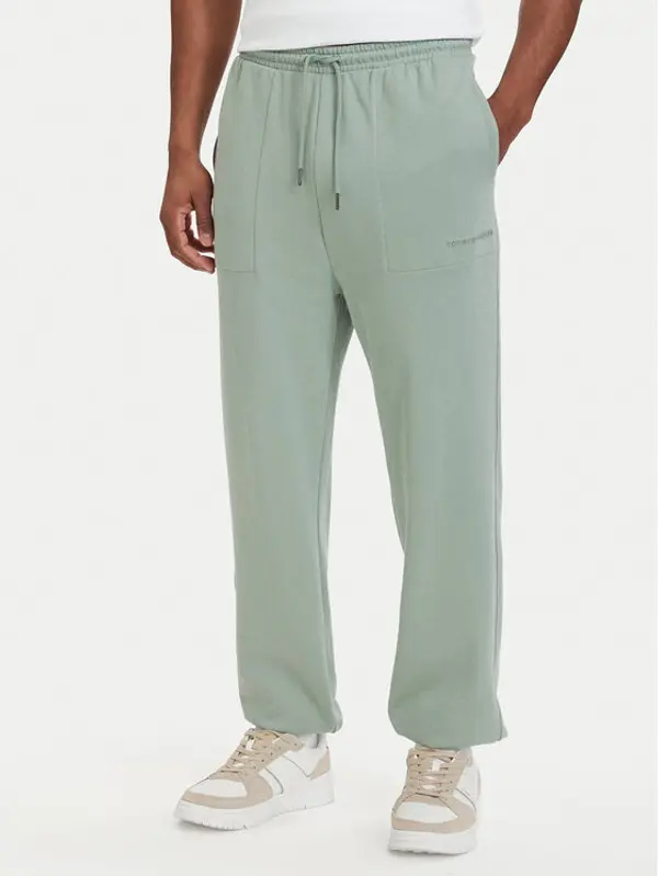 Tommy Hilfiger Tommy Hilfiger Donji dio trenerke Essential UM0UM03911 Svijetlo zelena Relaxed Fit