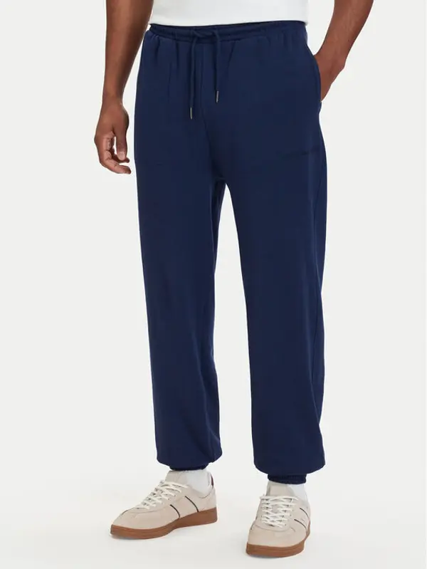 Tommy Hilfiger Tommy Hilfiger Donji dio trenerke Essential UM0UM03911 Tamnoplava Relaxed Fit