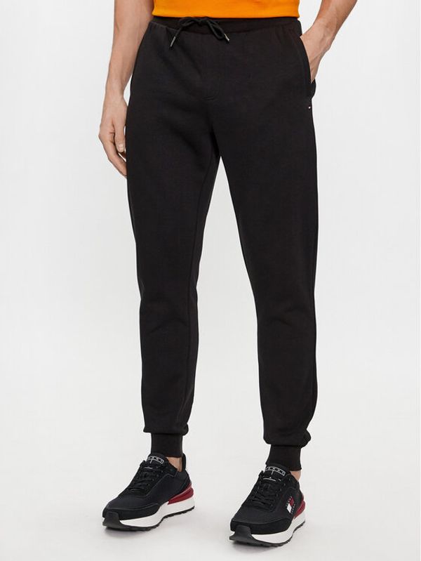 Tommy Hilfiger Tommy Hilfiger Donji dio trenerke Flag Logo MW0MW36142 Crna Relaxed Fit