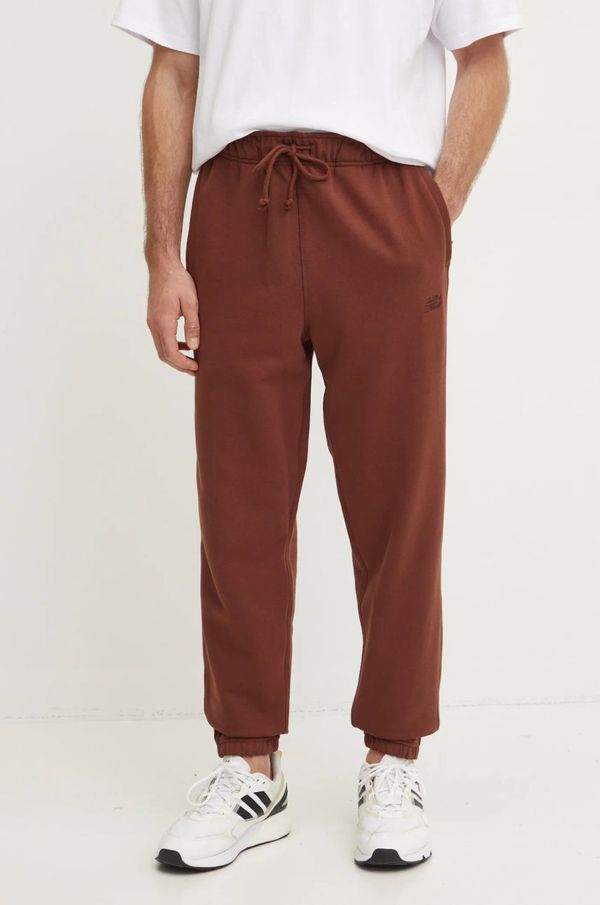 New Balance Pamučni donji dio trenirke New Balance boja: smeđa, bez uzorka, MP41508ROK