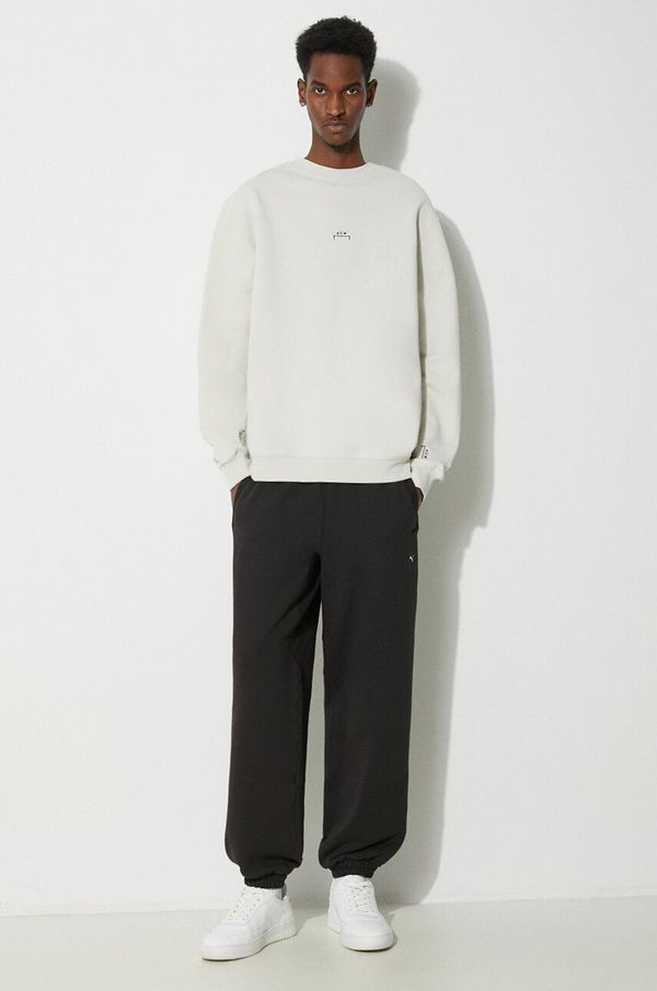 Puma Pamučni donji dio trenirke Puma MMQ Sweatpants boja: crna, bez uzorka, 624007