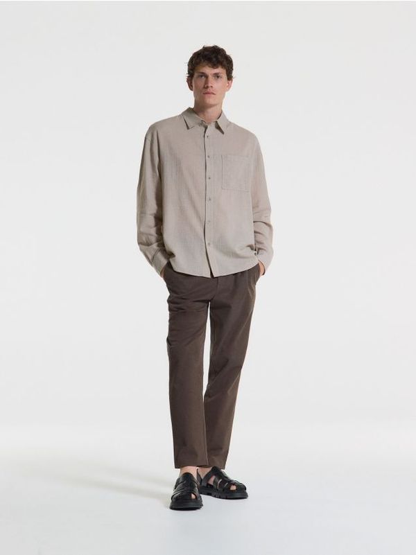 Reserved Reserved - Chino hlače s faldama - tamnosmeđe