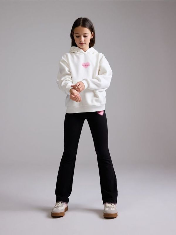 Reserved Reserved - Flare hlače - crno