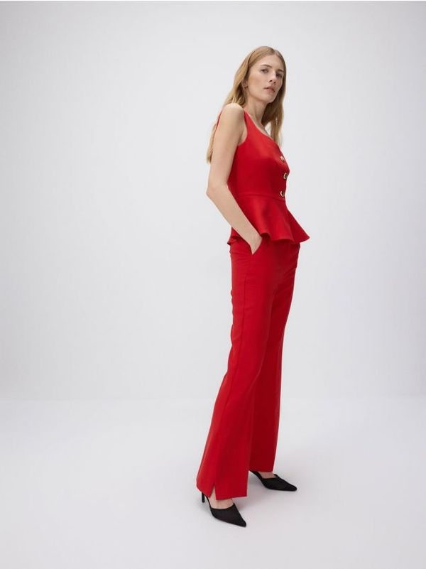 Reserved Reserved - Flare hlače od mješavine viskoze - crvena