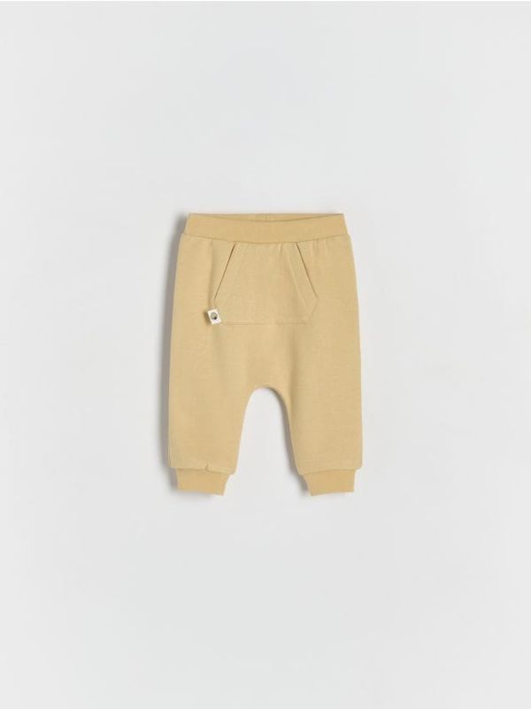 Reserved Reserved - Hlače od žerseja s džepom - bež