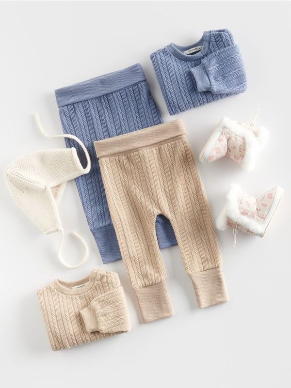 Reserved Reserved - Hlače s uzorkom - bež