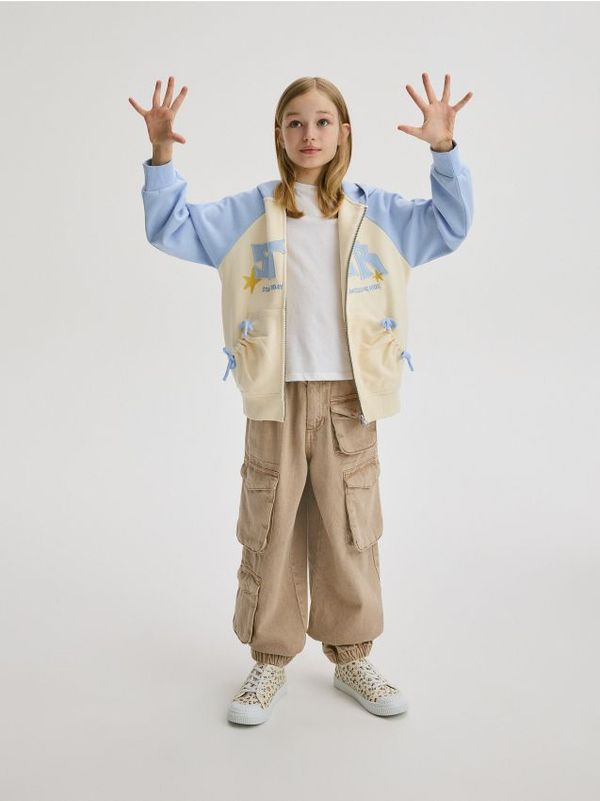 Reserved Reserved - Jogger traperice s džepovima - bež