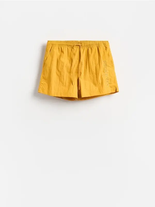 Reserved Reserved - MEN`S SWIMMING SHORTS - žuta boja