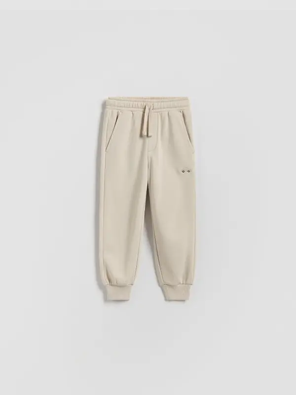 Reserved Reserved - Pamučne jogger hlače - bež