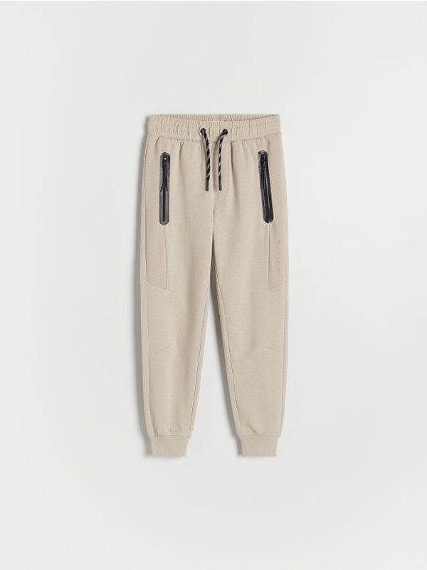 Reserved Reserved - Pamučne jogger hlače - bež