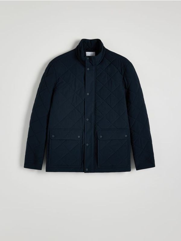 Reserved Reserved - Prošivena jakna s visokim ovratnikom - mornarsko plava