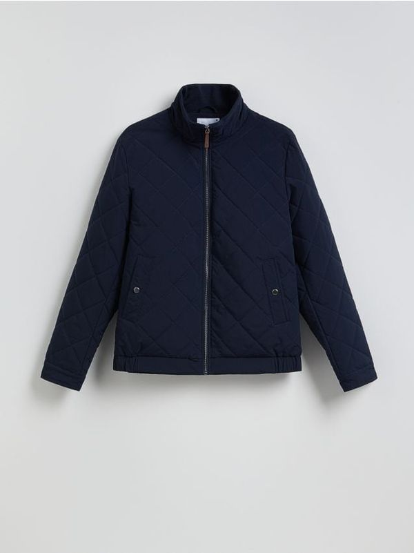 Reserved Reserved - Prošivena jakna s visokim ovratnikom - mornarsko plava