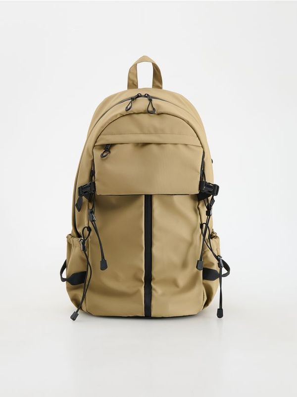 Reserved Reserved - Prostrani ruksak s džepovima - bež