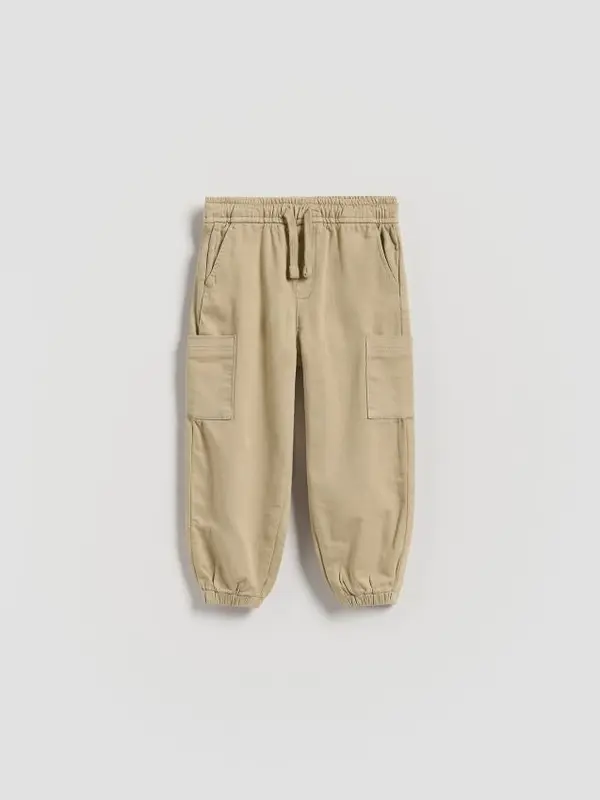 Reserved Reserved - Rastezljive cargo jogger hlače - bež