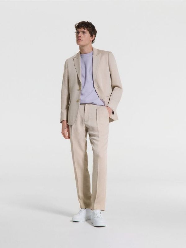 Reserved Reserved - Slim fit hlače s faldama - bež